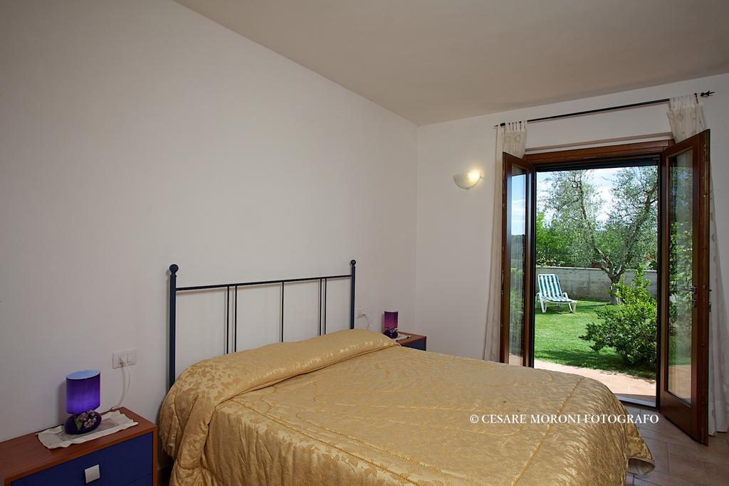 Residence Ai Campi Da Golf Saturnia Ruang foto