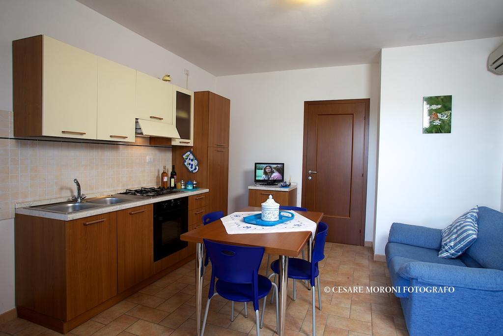 Residence Ai Campi Da Golf Saturnia Ruang foto